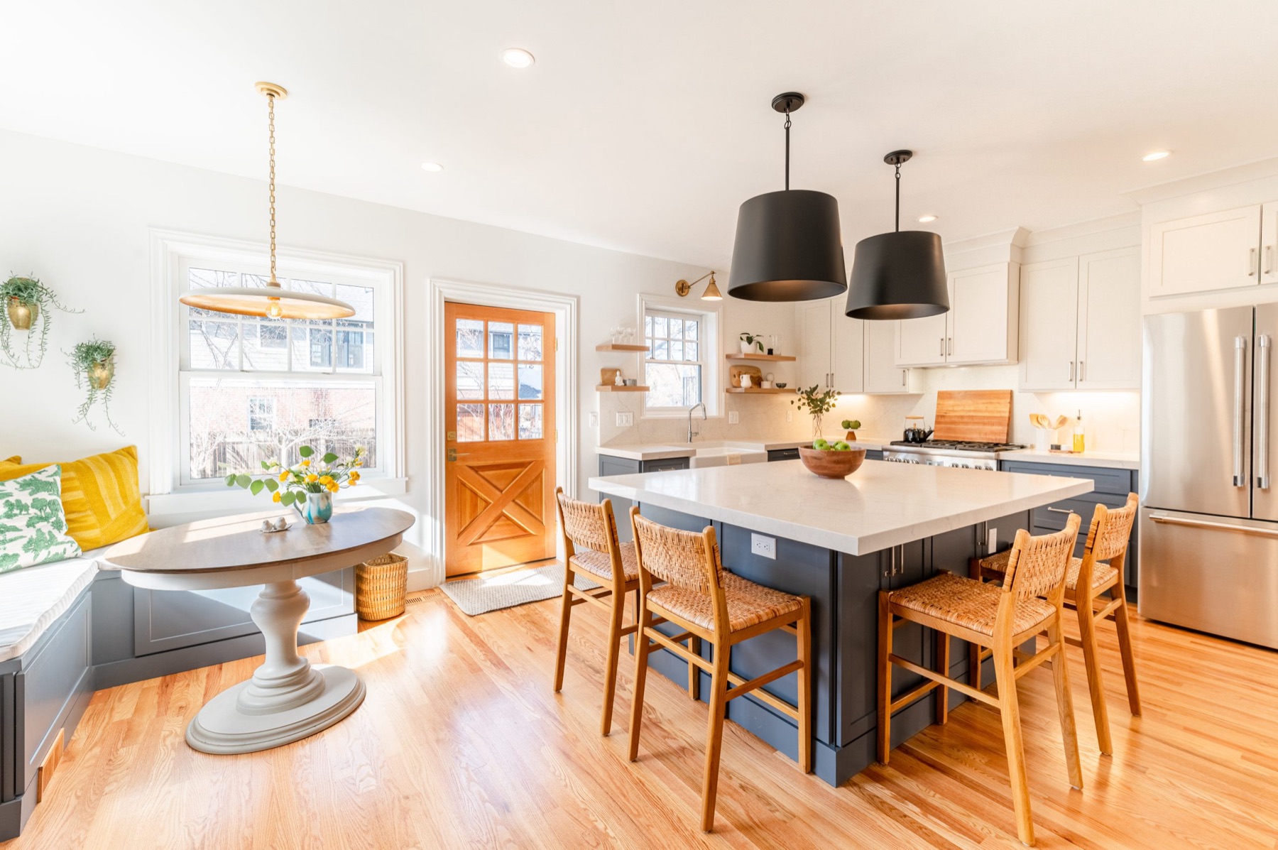 Cherry St. kitchen with navy island and breakfast nook