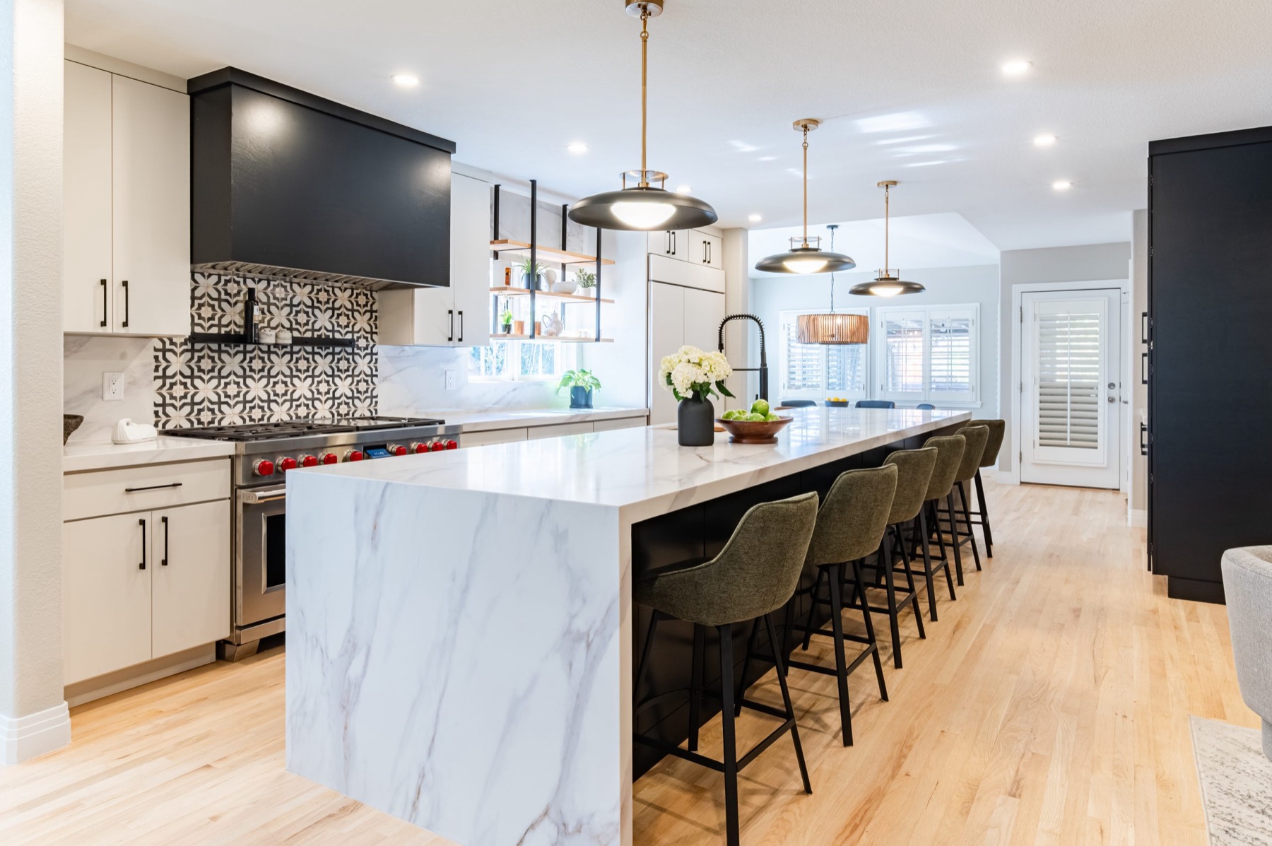 N. Monaco St. kitchen with marble waterfall island